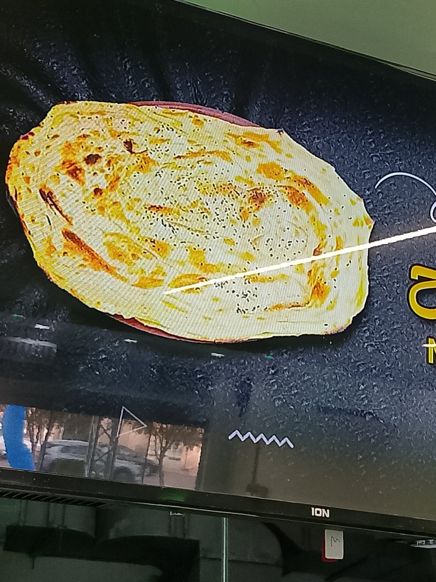 رغيف خبز ملوح مقرمش ومحمر بحبة البركة